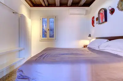 Letto o letti in una camera di Biennale Pano-View