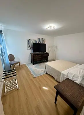 TV o dispositivi per l'intrattenimento presso Ai Portici Guest House