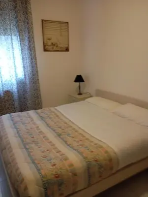 Letto o letti in una camera di Carinissimo vicino a Venezia