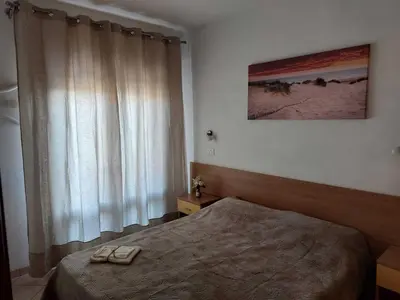 Letto o letti in una camera di Accommodation with terrace and parking