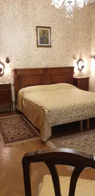 Letto o letti in una camera di Villa in stile vicino Treviso e Venezia