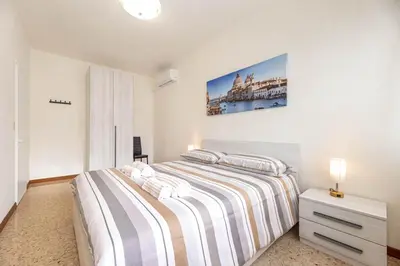 Letto o letti in una camera di Sole Apartment Residence In Venice - 5min from Airport