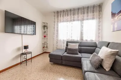 TV o dispositivi per l'intrattenimento presso Sole Apartment Residence In Venice - 5min from Airport