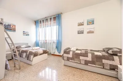 Letto o letti in una camera di Sole Apartment Residence In Venice - 5min from Airport