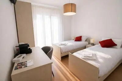 Letto o letti in una camera di Villa Lucchetta - Tre Camere e Appartamento con parcheggio Interno
