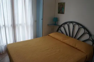 Letto o letti in una camera di Villa Caprera
