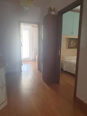 Letto o letti in una camera di Attico Alghe Rosse Jesolo lido