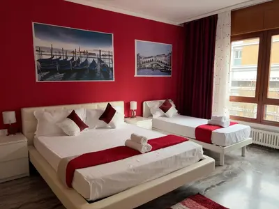 Letto o letti in una camera di Leone Di Venezia