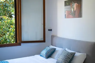Letto o letti in una camera di Ipin Home