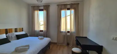 Letto o letti in una camera di Dimora Astolfo 1-2-3