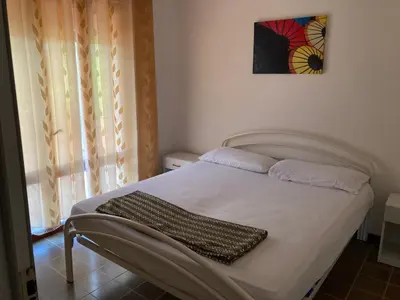 Letto o letti in una camera di Sabrina