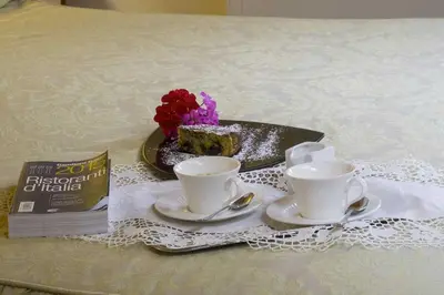 Letto o letti in una camera di Osteria Alla Pasina