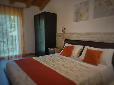 Letto o letti in una camera di B&B Al sogno di Laura