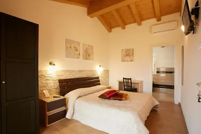 Letto o letti in una camera di B&B Al sogno di Laura