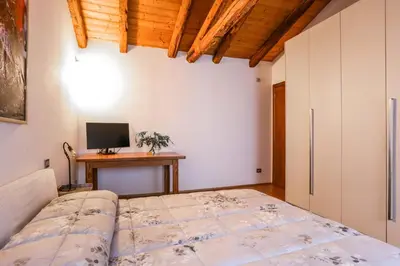 Letto o letti in una camera di Casa Fiera Treviso