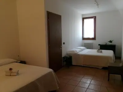 Letto o letti in una camera di La Dimora dei Cri