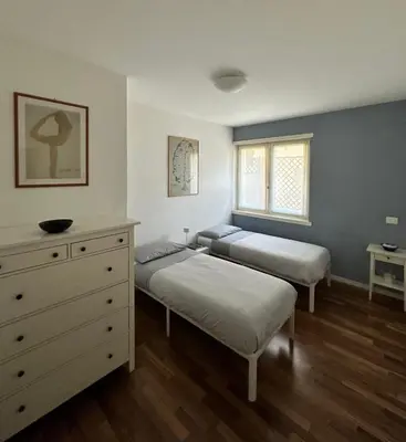 Letto o letti in una camera di Viale Ortigara Apartment