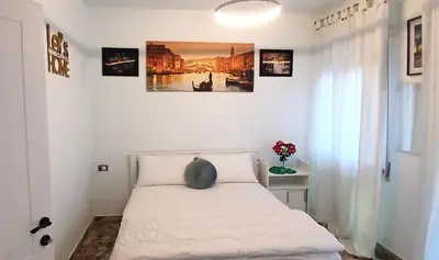 Letto o letti in una camera di Om House Venezia