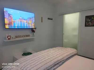 Letto o letti in una camera di Om House Venezia