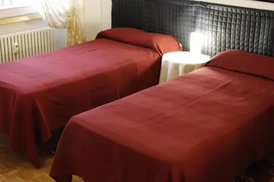 Letto o letti in una camera di A Casa Mia