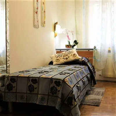 Letto o letti in una camera di A Casa Mia