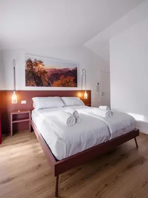 Letto o letti in una camera di Lambo Cellini - Bed & Breakfast