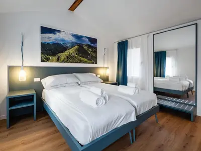 Letto o letti in una camera di Lambo Cellini - Bed & Breakfast