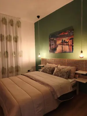 Letto o letti in una camera di YourHomeinVenice