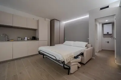 Letto o letti in una camera di The Cereria Design Flats - Il Ceraiolo Pet Free