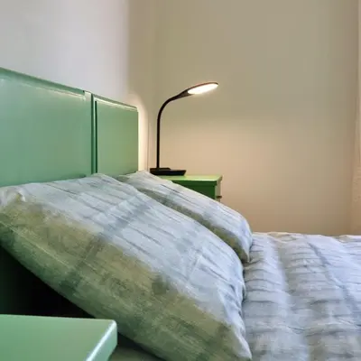 Letto o letti in una camera di Dai Freschi - Casa in campagna a Trevignano