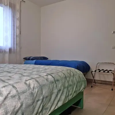 Letto o letti in una camera di Dai Freschi - Casa in campagna a Trevignano