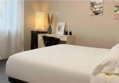 Letto o letti in una camera di Bellavista Residence