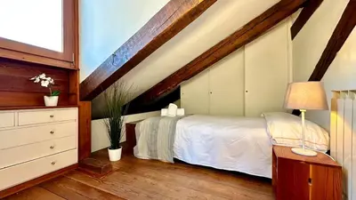 Letto o letti in una camera di Miracoli Terrace - 300mt from Rialto Bridge