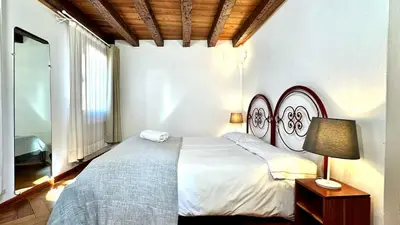 Letto o letti in una camera di Miracoli Terrace - 300mt from Rialto Bridge