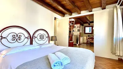 Letto o letti in una camera di Miracoli Terrace - 300mt from Rialto Bridge