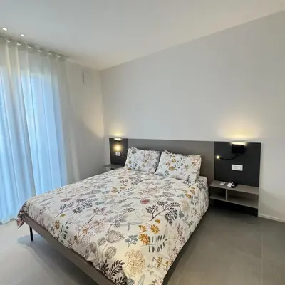 Letto o letti in una camera di A&G Dusty Rose flat