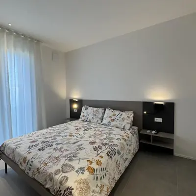 Letto o letti in una camera di A&G Dusty Rose flat