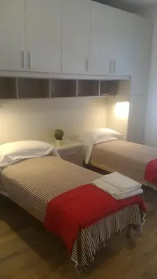Letto o letti in una camera di enJoy Home - Comodo Bilocale in zona Ospedali