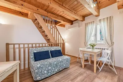Letto o letti in una camera di Mansarda autentica a Castello, zona Biennale
