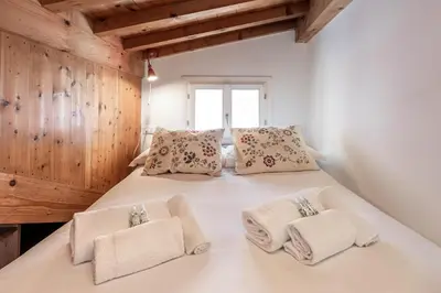 Letto o letti in una camera di Mansarda autentica a Castello, zona Biennale