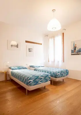 Letto o letti in una camera di Ca' Venissa