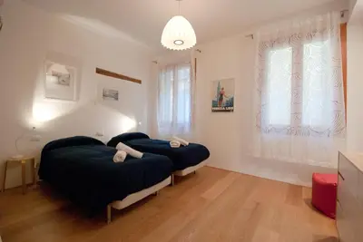 Letto o letti in una camera di Ca' Venissa