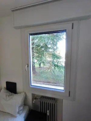 Letto o letti in una camera di Grace House