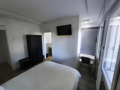 Letto o letti in una camera di Grace House