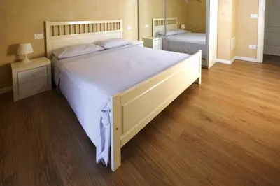 Letto o letti in una camera di Chez Alberto