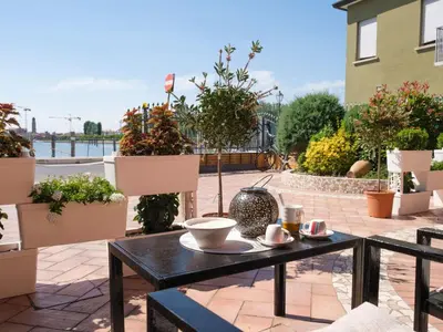 Giardino di Apartment Wohnung mit Meerblick by Interhome