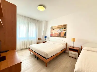 Letto o letti in una camera di Corradini 8 - Carraro Immobiliare - Family Apartments
