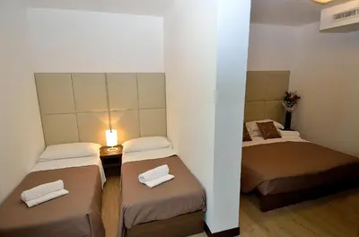 Letto o letti in una camera di Hotel San Giuliano