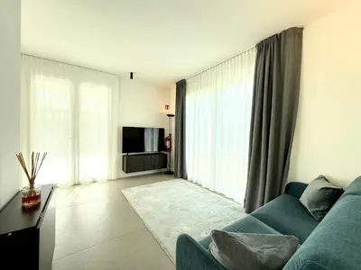 TV o dispositivi per l'intrattenimento presso Le Jolie - Carraro Immobiliare - Family Apartments
