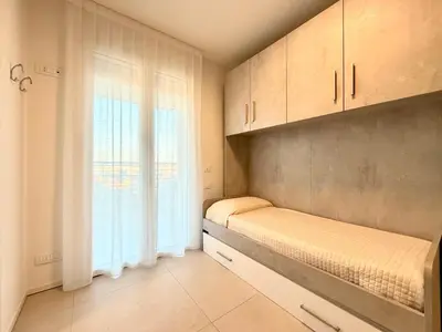 Letto o letti in una camera di Meit 5b - Carraro Immobiliare - Family Apartments